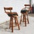 Paul Frankl Style Stools Faux Bamboo 3 Strand backs with swivel. Reupholstery recommended. We also have another set of 3...