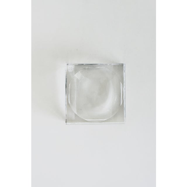 Beautifully minimalist lead crystal ashtray made by Baccarat circa 1980s. A perfect square featuring clean lines and a...