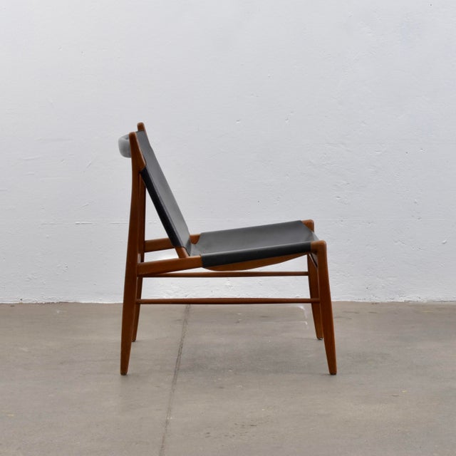 The Chimney Chair, model number 1192, designed in 1958 by Franz Xaver Lutz for Deutsche Werkstätten WK Möbel, is also...