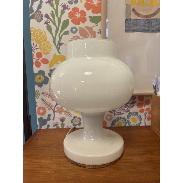 White glass table lamp by Valasske Mezirici, 1970s Made in Czechoslovakia. Fully functional. Original condition. This...