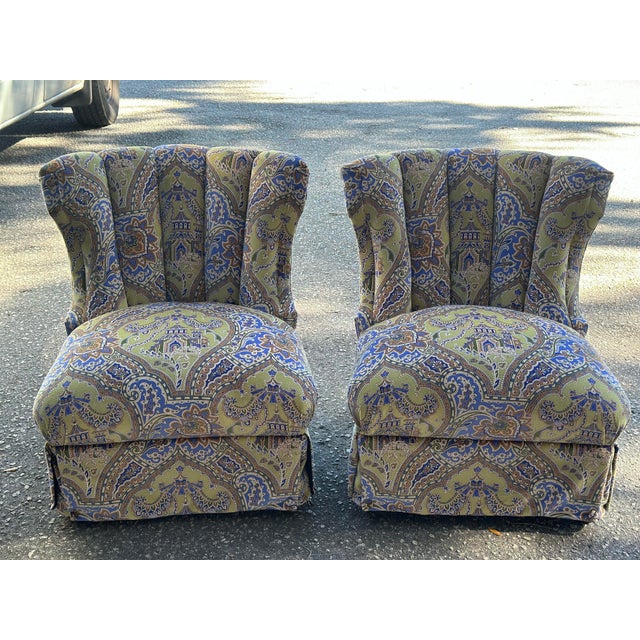 These are a pair of vintage tufted club / lounge chairs, likely late-1960s to early-1970s (possibly American transitional...