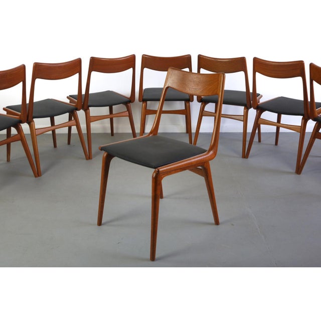 About these RARE Erik Christensen Teak Boomerang Dining Chairs - A Set of 8, Denmark These impeccably built, ingenuously...