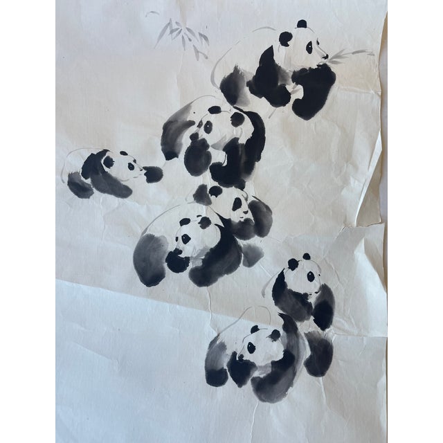 This vintage ink painting by J.P.Gaston features a whimsical and dynamic grouping of pandas rendered in traditional...
