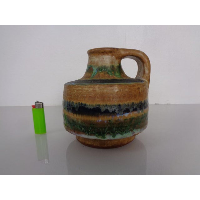 Ceramic Henkel vase by Fridegart Glatzle for Karlsruhe Majolica from the 1970s. Inscribed on the underside. This piece has...