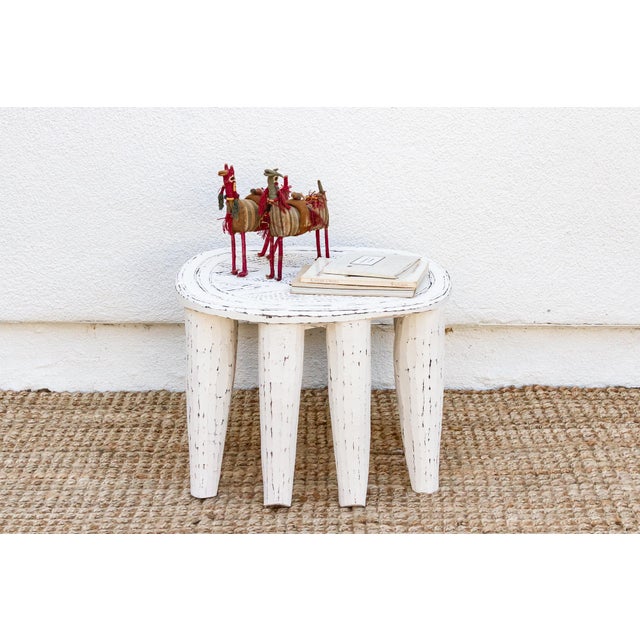 A unique piece of African art, this vintage Nupe table from Nigeria is a must-have for collectors and enthusiasts of Nupe...