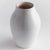 Subtle throw lines and natural textures from the firing process give this terracotta vase a vintage look. Finished in a...