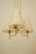 An elegant pendant lamp from the 1950's in brass with three shades. This is a beautifully composed lamp made up of just a...