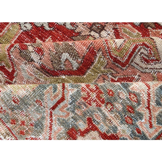 Early 20th Century Antique Persian Heriz Rug With Geometric Medallion Design in Red & Soft Colors For Sale - Image 11 of 12