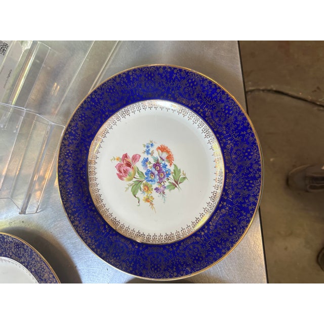 Up for consideration is a beautiful vintage deep blue 24kt gold plate set with floral accents. This would look lovely in...