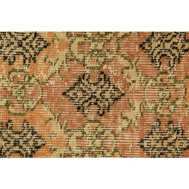Hand-knotted in wool and originating from Turkey circa 1960 – 1970, this 3x5 vintage Zeki Müren rug is a unique addition...