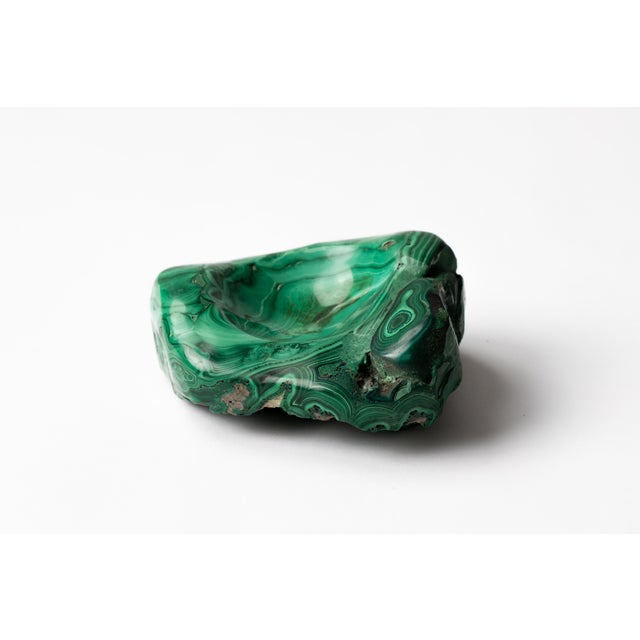 Natural malachite stone specimen vide poche tray hand carved at center. May be used as a decorative object or used as a...