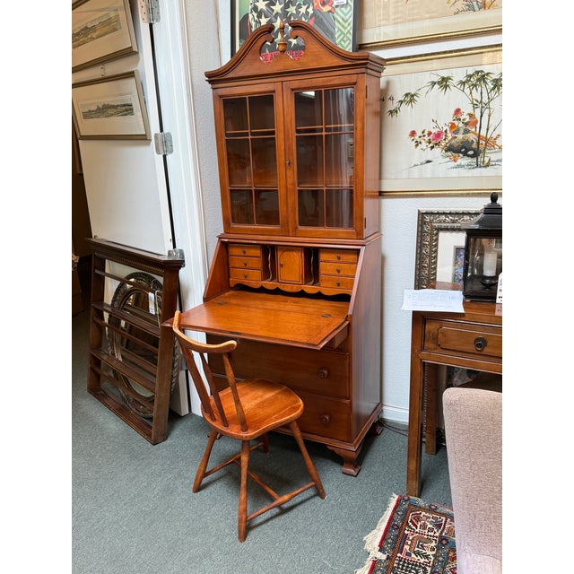 Design Plus Gallery presents a Secretary Desk with Chippendale Style/Early American Design. This frontier style piece was...