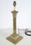 Lovely brass table lamp base in the shape of a Corinthian column, sitting on a stepped, fluted square plinth and topped...