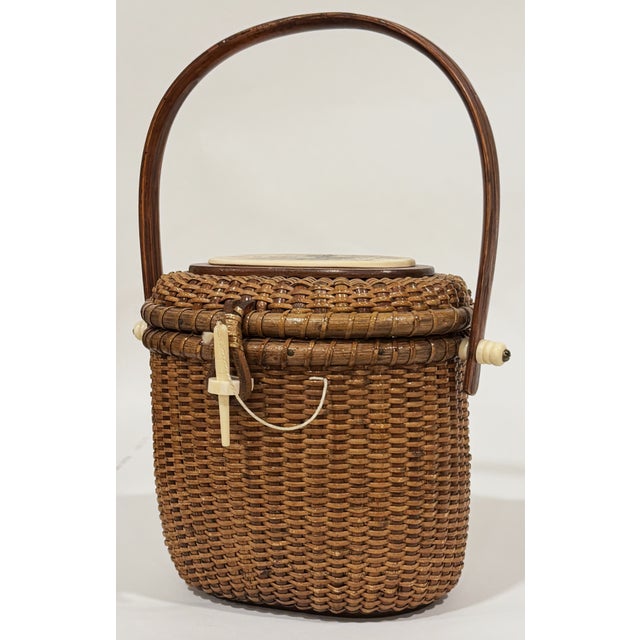 Farnum made high end reproductions of the original Nantucket friendship baskets. This is a specific unique example of...