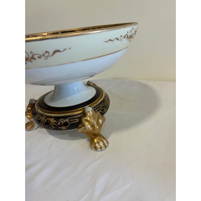 A dramatic antique two-piece centerpiece by Nippon: a hand-painted scenic bowl paired with a separate matching gilded...