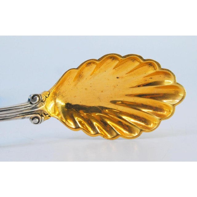 Silver Fruit Spoon with Golden Shell and Handle with Grooves and Reliefs, in Very Good conditions. Designed 1920 to 1949...