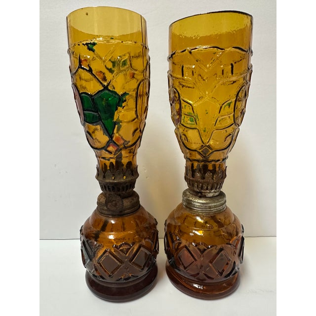 Set of 2 Sail Boat (made in Hong Kong) amber stained glass lanterns. They are crafted from amber-colored pressed glass...