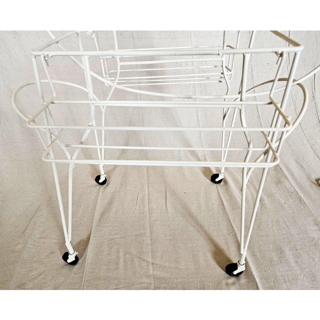 An MCM Retro Pony Bar Cart Service Tray on swivel wheels. this item is 100 Original and complete featuring twin side...