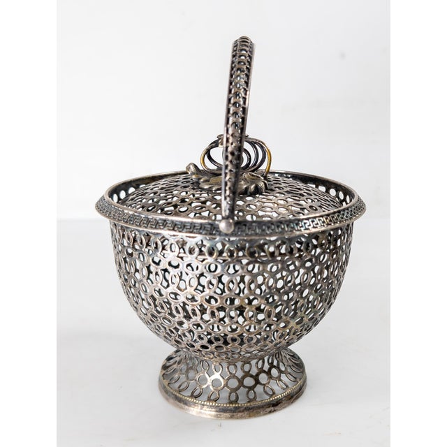 We are selling this cool reticulated openwork small candy basket or bowl. This piece has really attractive simple design...