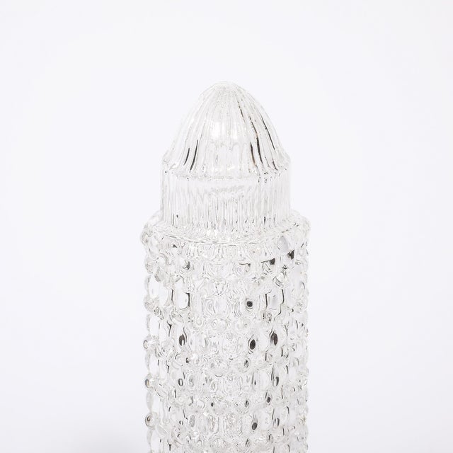 This elegant and well scaled Art Deco Cut glass Uplight W/Fluted and Geometric Detailing on Hexagonal Base originates from...