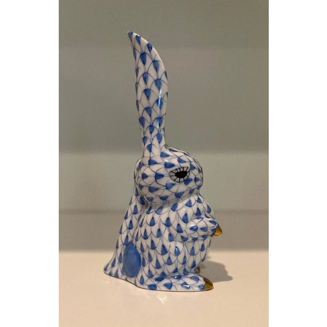 This adorable rabbit is called "One Ear Up" - and - is part of my collection of 17 Herend Blue Rabbits which I am selling...