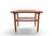 This side table was designed by Holger Georg Jensen and produced by Kubus in Denmark during the 1960s. The teak top sits...