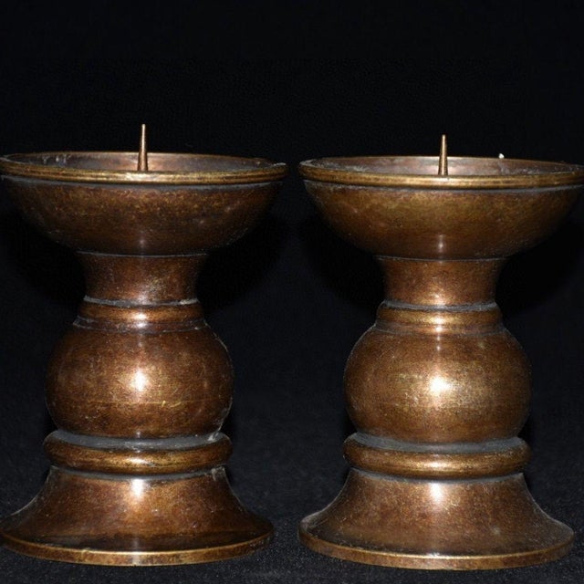 This exquisite pair features a classic, heavy-duty design with a beautiful, aged patina that gives them a rich, vintage...