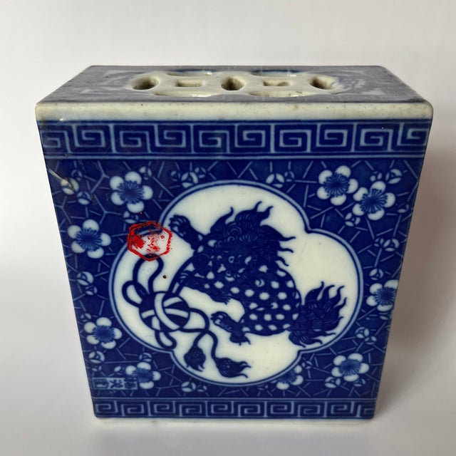 A single antique rectangular Chinese export porcelain pillow or head rest featuring traditional decoration including a...