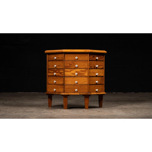 Handpicked by IndustrialArtifact Vintage from the 1930s About this item This small parts cabinet features an array of...