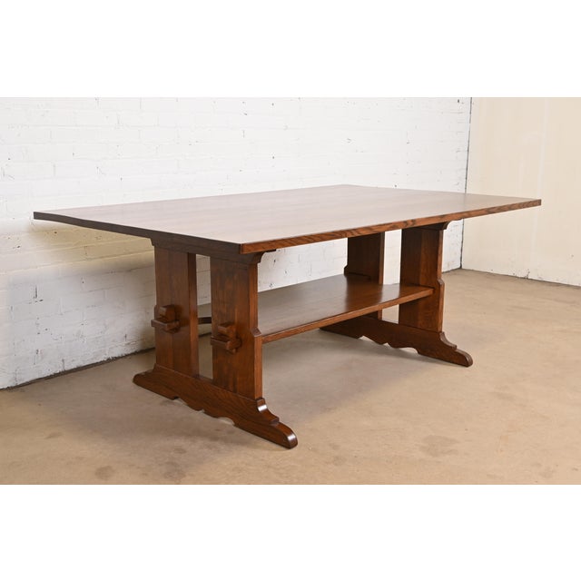 An exceptional Mission or Arts & Crafts solid quarter sawn oak trestle dining table, library table, or writing desk By L....