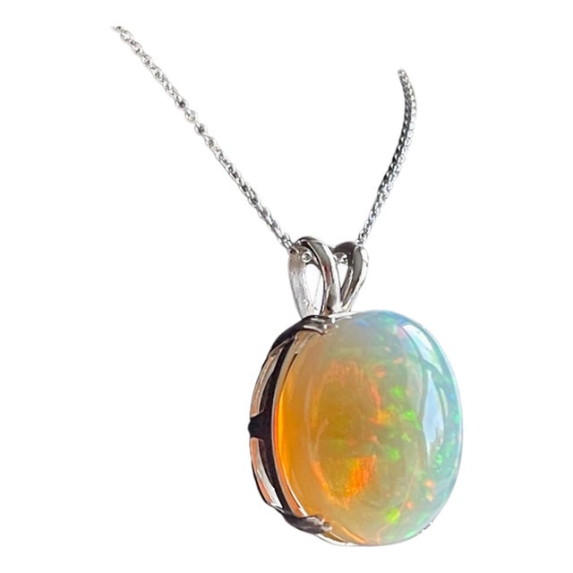 40 Carat Oval Ethiopian Opal Pendant / Necklace 14 Karat White Gold Necklace For Sale