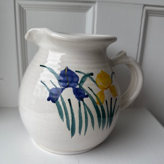 Beautiful vintage hand, painted ceramic pitcher made and painted in Portland, Oregon. Features lovely blue and yellow...