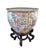 Superb large chinoiserie Rose Medallion porcelain goldfish planter on a black wood stand, circa mid-20th century....