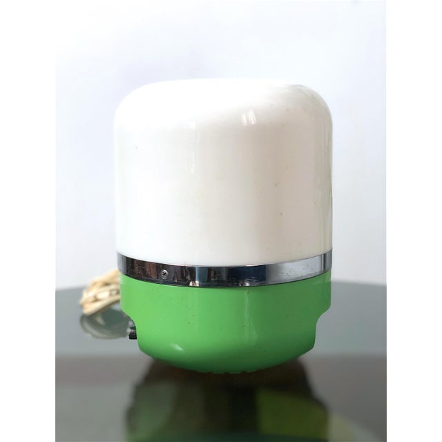 Iconic Europhon table/desk lamp designed by Adriano Rampoldi. This piece features the iconic Aqua Green color, perfectly...