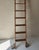 Putnam Rolling Ladder Co. sturdy antique oak library ladder with original cast iron mounting hardware and decorative brass...