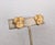 1960s textured goldtone pansy with faux-pearl center clip and adjustable screw back earrings. Marked "NAPIER©" on the...
