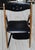 This mid-century folding chair is a great chair to have available when you need one more seat. It is also a great looking...