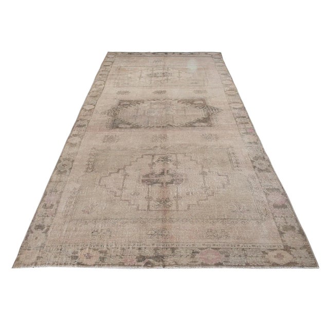 Vintage handknotted decorative wool rug from Kars region of Turkey. Approximately 50-60 years old. In very good condition.