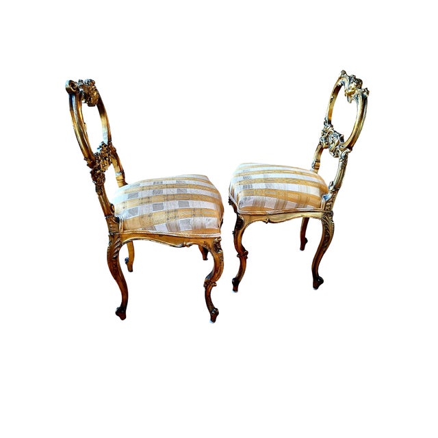 Rococo A Pair of Rococo-Style, Gilded and Putti-Adorned Side Chairs For Sale - Image 3 of 12