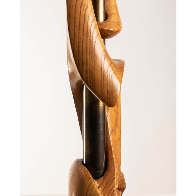Sculptural table lamp attributed to Philip Heifetz, with a hand-carved solid wood base of organic and biomorphic...