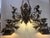 Vintage Wrought Iron Hand Forged Light. This light has 2 center bulbs and four outer. Double sided light. Great for...
