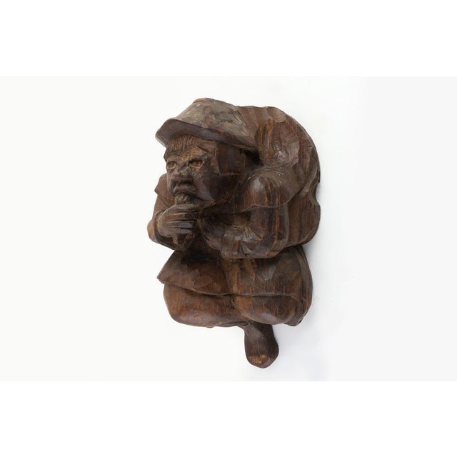 This mid‑19th‑century French carved oak wall figure is a powerful example of rural craftsmanship, expressive carving, and...