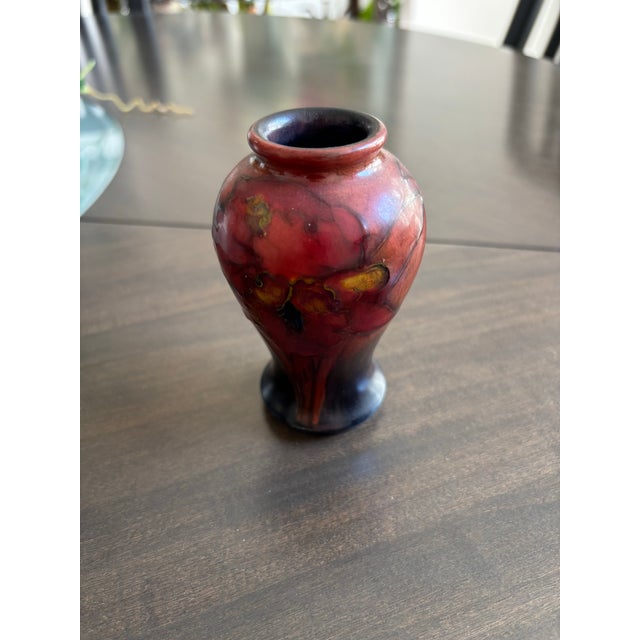 Moorcroft Pomegranate Vase circa 1913 to 1928 is marked as “Made In England”, and is in superb condition with no chips...