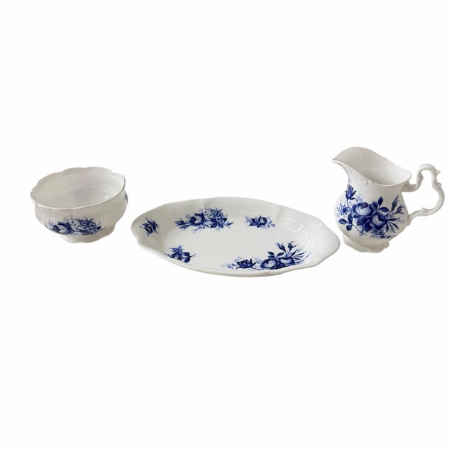 Offering a vintage Royal Albert Connoisseur creamer and open sugar set with a tray, Features a blue and white floral...