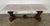 A monumental and sculptural European Baroque Revival coffee table, dating to the late 19th to early 20th century (circa...