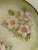 HandPainted green and gold gilt plate with floral design, dogwood flowers