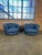 A gorgeous pair of swivel lounge chairs attributed to Radnor in like-new condition, sold individually. The sculptural...