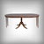 This mahogany extendable pedestal table, made in the 1960s, elegantly illustrates the inspiration of the English style....