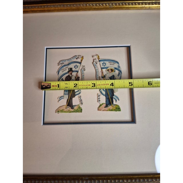 A beautifully preserved and professionally framed pair of early 20th-century Jewish New Year (Rosh Hashanah) die-cut...