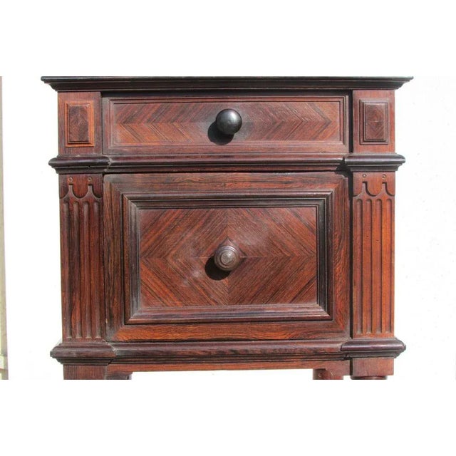 Art Deco period in an empire style,. Geometric patterns in herringbone, on wheels in bronze, white marble embedded,...